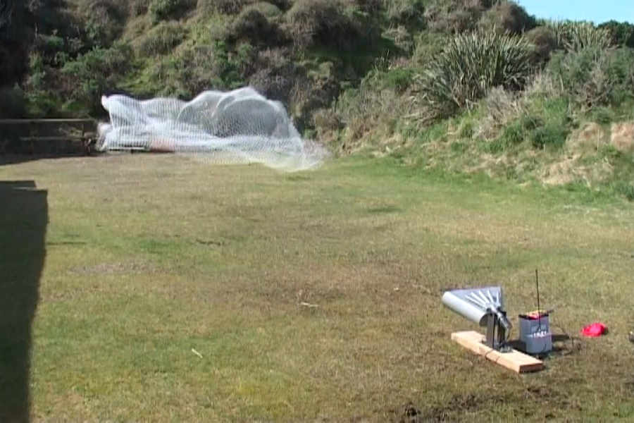 Ace Capture mounted horizontal-launching pigeon net gun showing horizontal net trajectory